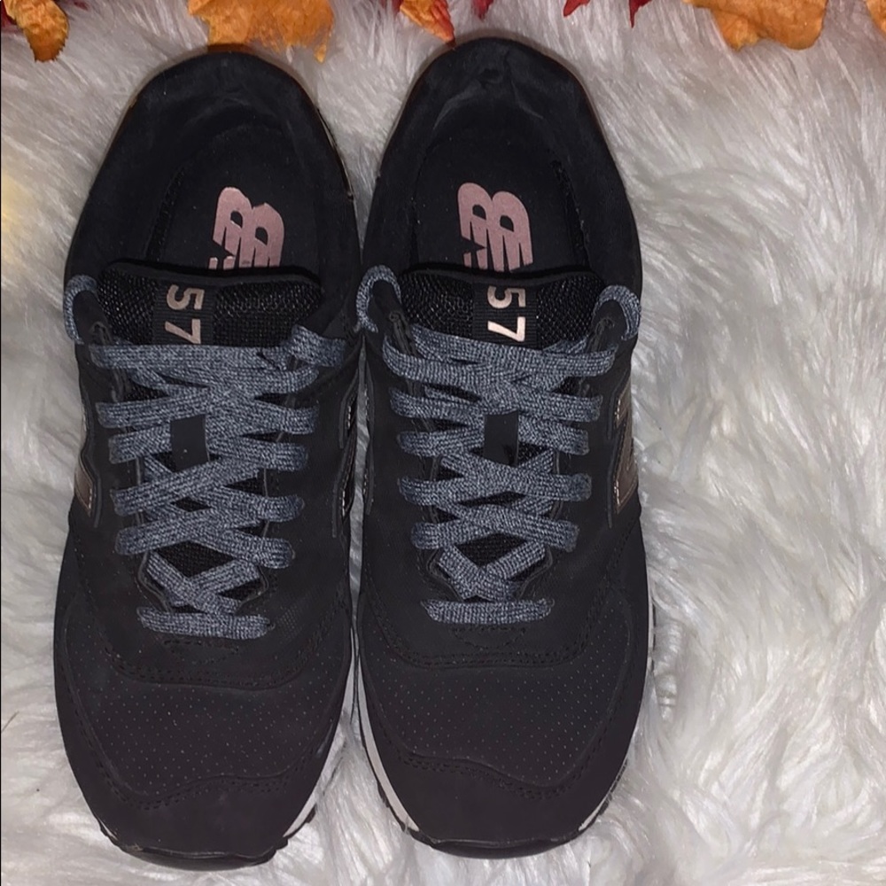 rose gold and black new balance 574s
